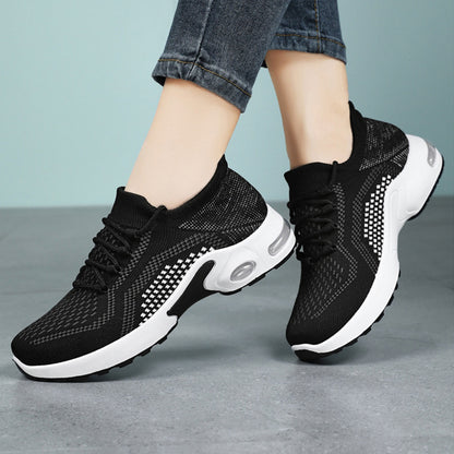 Zapatillas de deporte con cordones y cojín de aire, tejido transpirables.